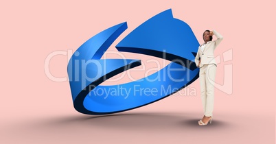 Thoughtful businesswoman by blue arrow sign