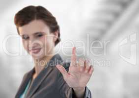 Composite image of smiling businesswoman standing