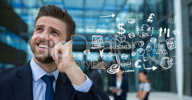Digital composite image of businessman using smart phone by icons