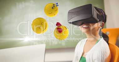 Happy girl looking at emojis on VR glasses