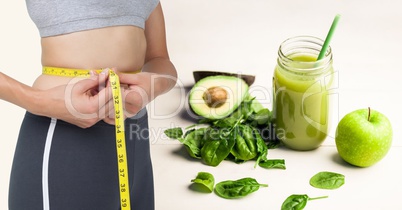 Composite image of woman and healthy food