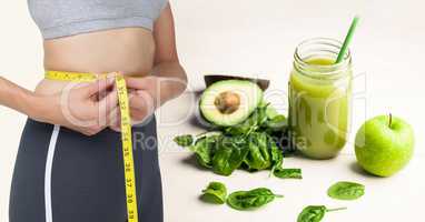 Composite image of woman and healthy food