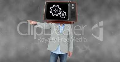 Businessman pointing while wearing TV on head