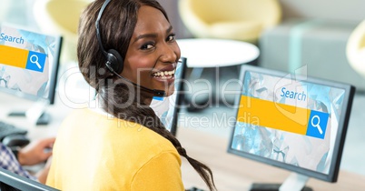 Female customer service representative wearing headphones while searching on net