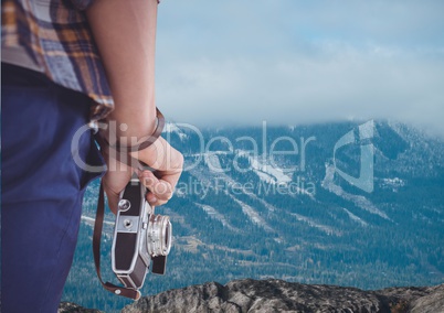 mountain travel,hand with camera.