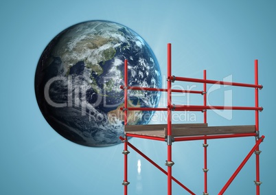 Globe next to scaffolding against blue background