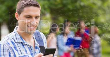 Digitally generated image of male college student using phone by various math formulas with friends