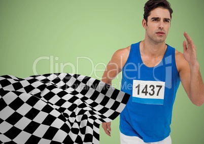 Male runner sprinting against green background and checkered flag