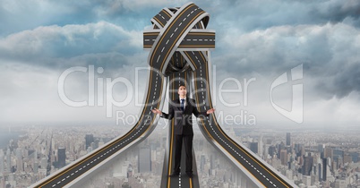 Digital composite image of confused businessman standing on jumbled highway