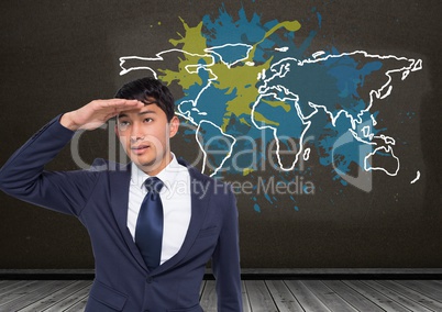 Businessman looking ahead with Colorful Map with paint splattered wall background