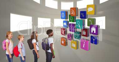 School children looking at various app icons
