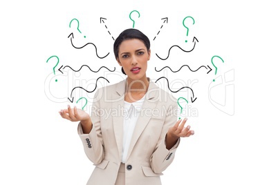 Confused businesswoman with arrows and question marks