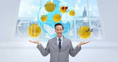 Digital composite image of businessman with various emojis against globe