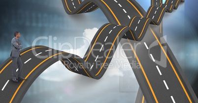 Digital composite image of businessman standing on wavy highway