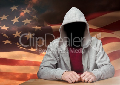 Anonymous Criminal in hood in front of American flag