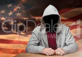 Anonymous Criminal in hood in front of American flag