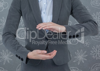 Businessman holding invisible object with pattern background