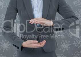 Businessman holding invisible object with pattern background