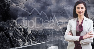 Digital composite image of businesswoman with mountain and graph on grid in background