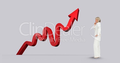 Digital composite image of businesswoman looking at fluctuating arrow sign