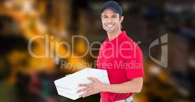 Happy delivery man holding pizza box