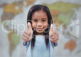 Girl with two thumbs up against blurry map