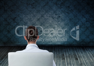 Woman in chair with room background