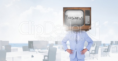 TV on businessman's head with business written on screen
