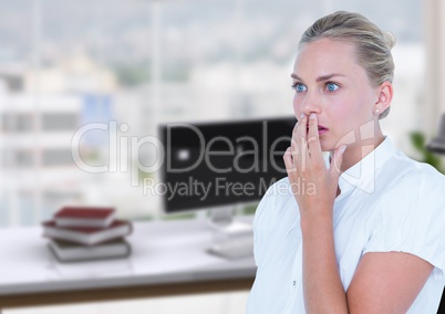 Business woman scared in the office desk