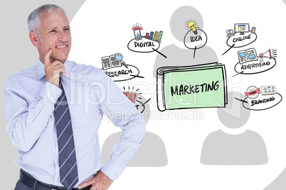 Thoughtful businessman by marketing text and icons