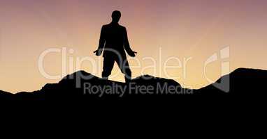 Silhouette professional standing on mountain against sky