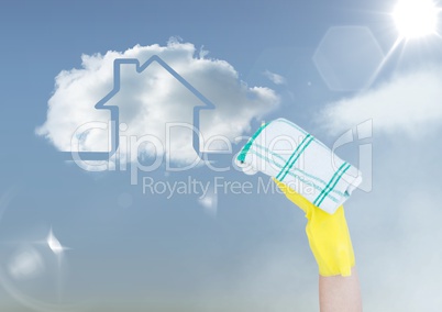 Hand with cloth cleaning the sky. With cloud house
