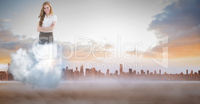 Digitally generated image of businesswoman on cloud against city