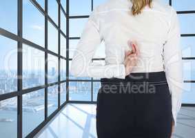 Business woman looking the landsacape with his fingers crossed
