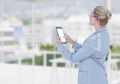 Business woman with tablet in the office
