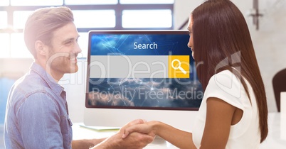 Smiling man and woman shaking hands with search screen on monitor