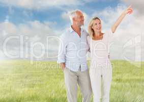 Couple walking in meadow nature