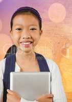 Girl with tablet against map with bokeh