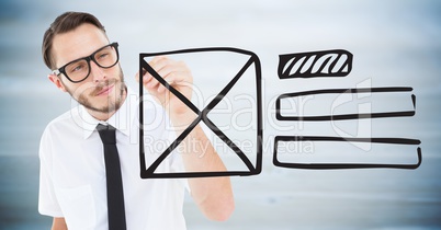 Business man with marker and website mock up against blurry grey wood panel