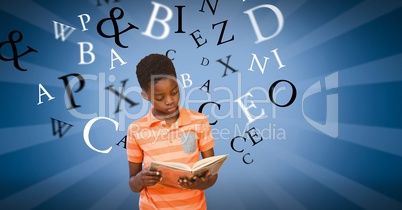 Male student studying while alphabets flying in background