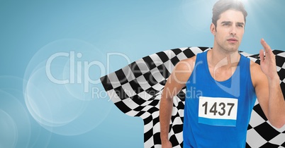 Male runner sprinting against blue background with flare and checkered flag