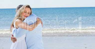 Loving couple embracing at beach