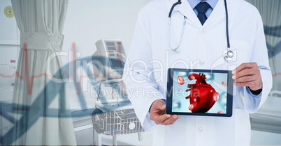 Composite image of doctor showing table with heart