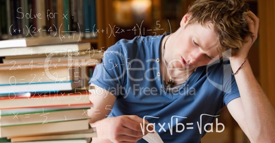 Digital composite image of various math equations by tensed college students studying at table in li