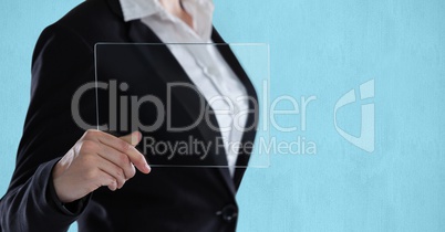 Midsection of businesswoman holding transparent device