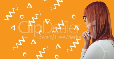 Woman in glasses profile against orange background with white patterns