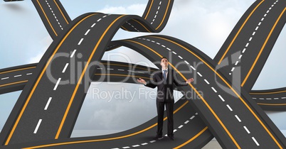 Digitally generated image of businessman standing on wavy road in sky