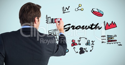 Back of business man with marker against growth doodles and blue background