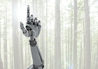 Android Robot hand pointing with bright forest background