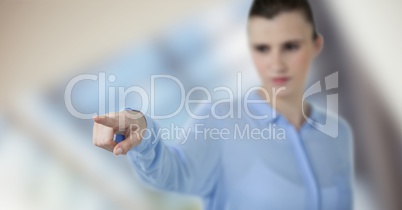 Businesswoman pointing in office